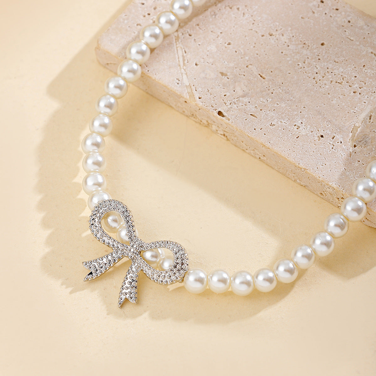 Novien Diamond Bow Pearl Necklace