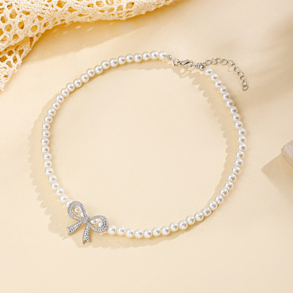 Novien Diamond Bow Pearl Necklace