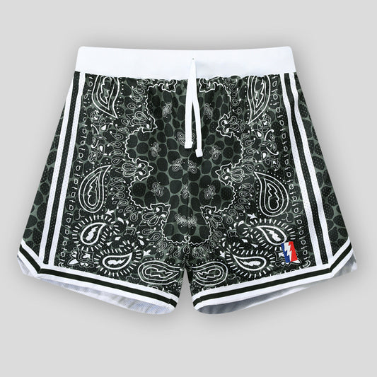 Model wearing printed mesh casual shorts in a relaxed streetwear style from Novien Apparel