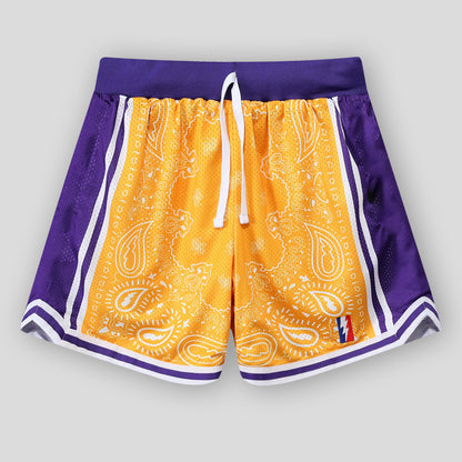 Model wearing printed mesh casual shorts in a relaxed streetwear style from Novien Apparel