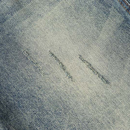 Distressed Denim Jeans