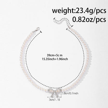 Novien Diamond Bow Pearl Necklace